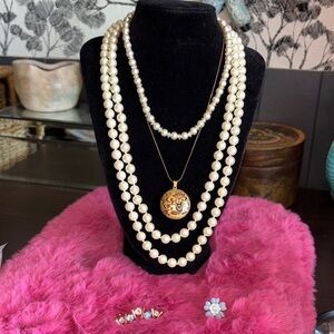 VINTAGE set of three necklaces and two small brooches. One necklace is a faux p